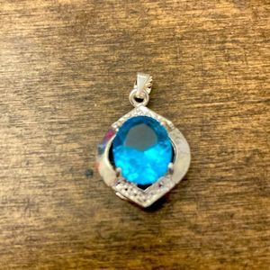 5/$25 Faux Pendant: silver with aquamarine and diamonds. Costume Jewelry.